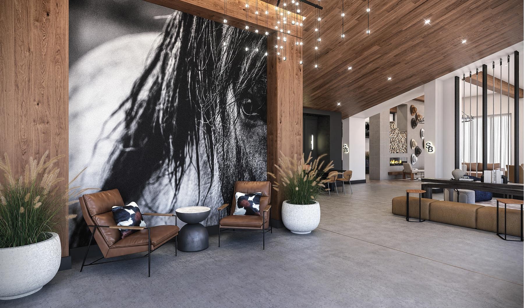 a spacious room with a large painting of a horse