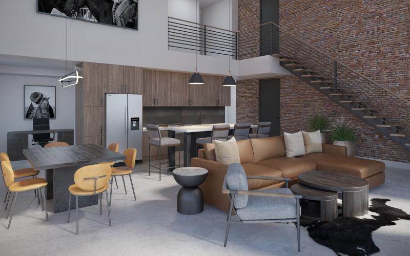 a room with a couch and chairs