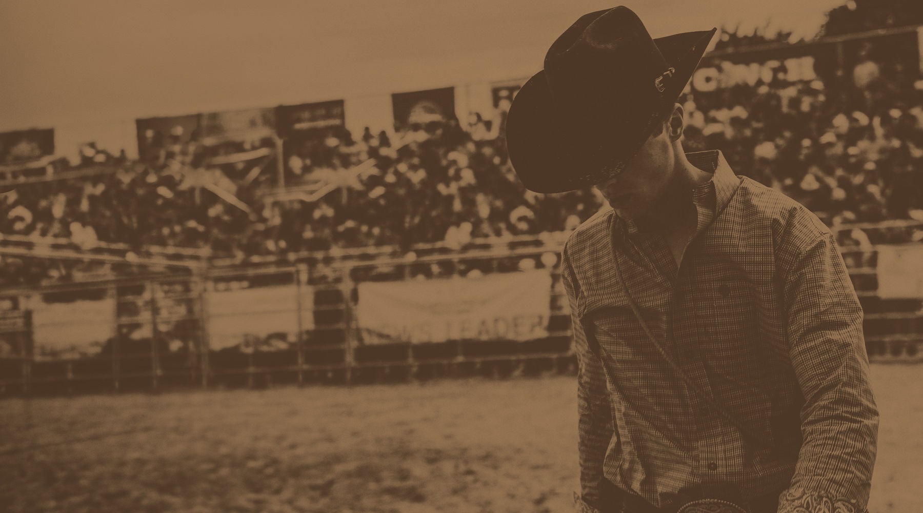 a cowboy in an arena