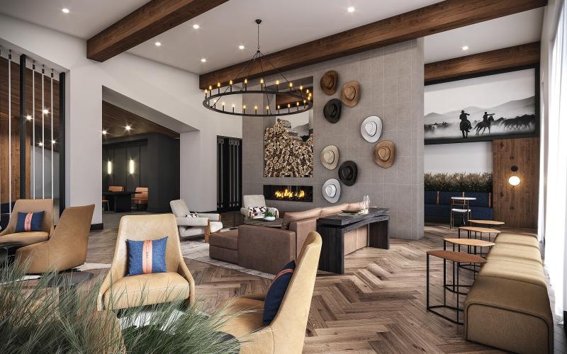 a living room with a chandelier and lounge seating